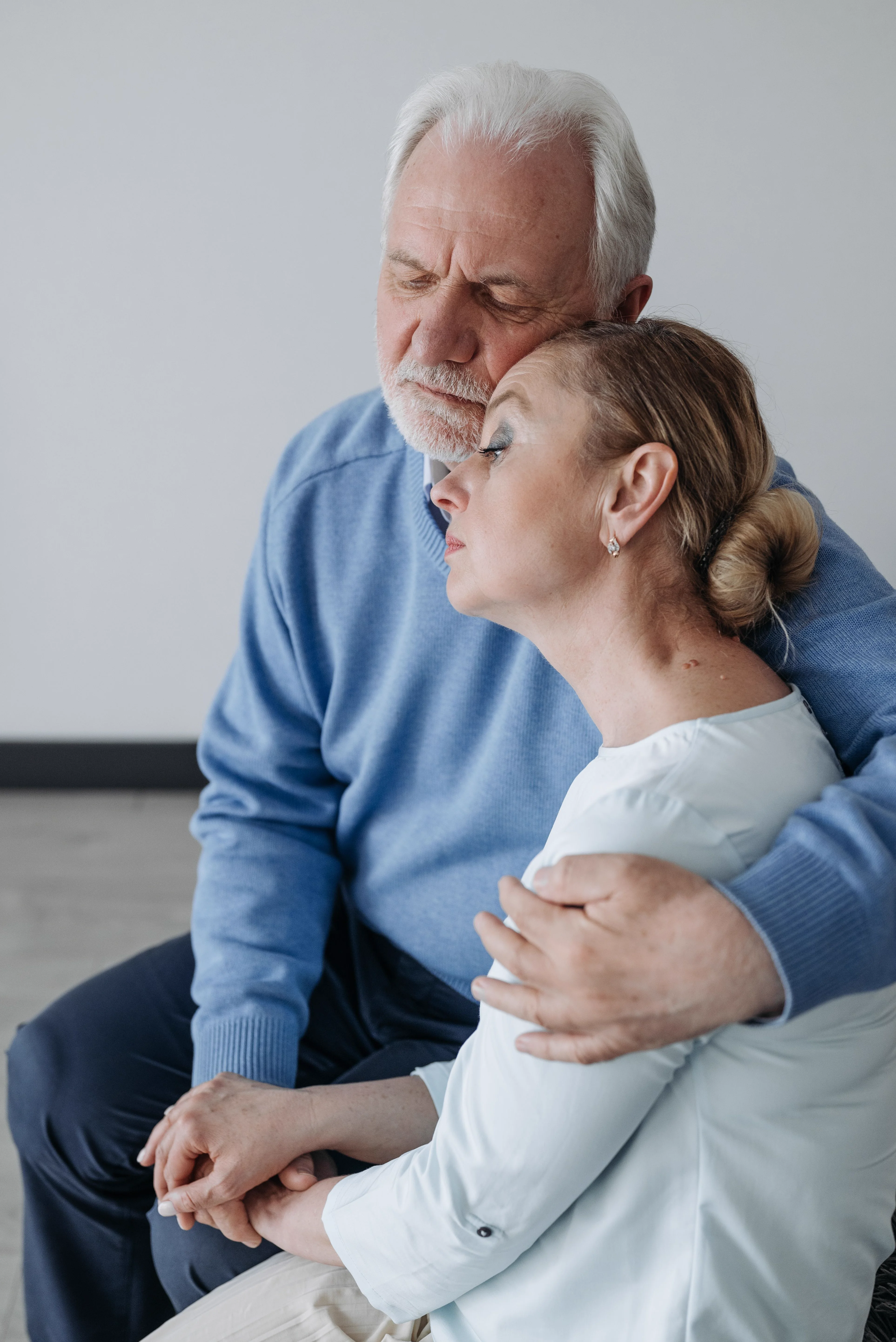 A caregiver and senior sharing a calm, caring moment
